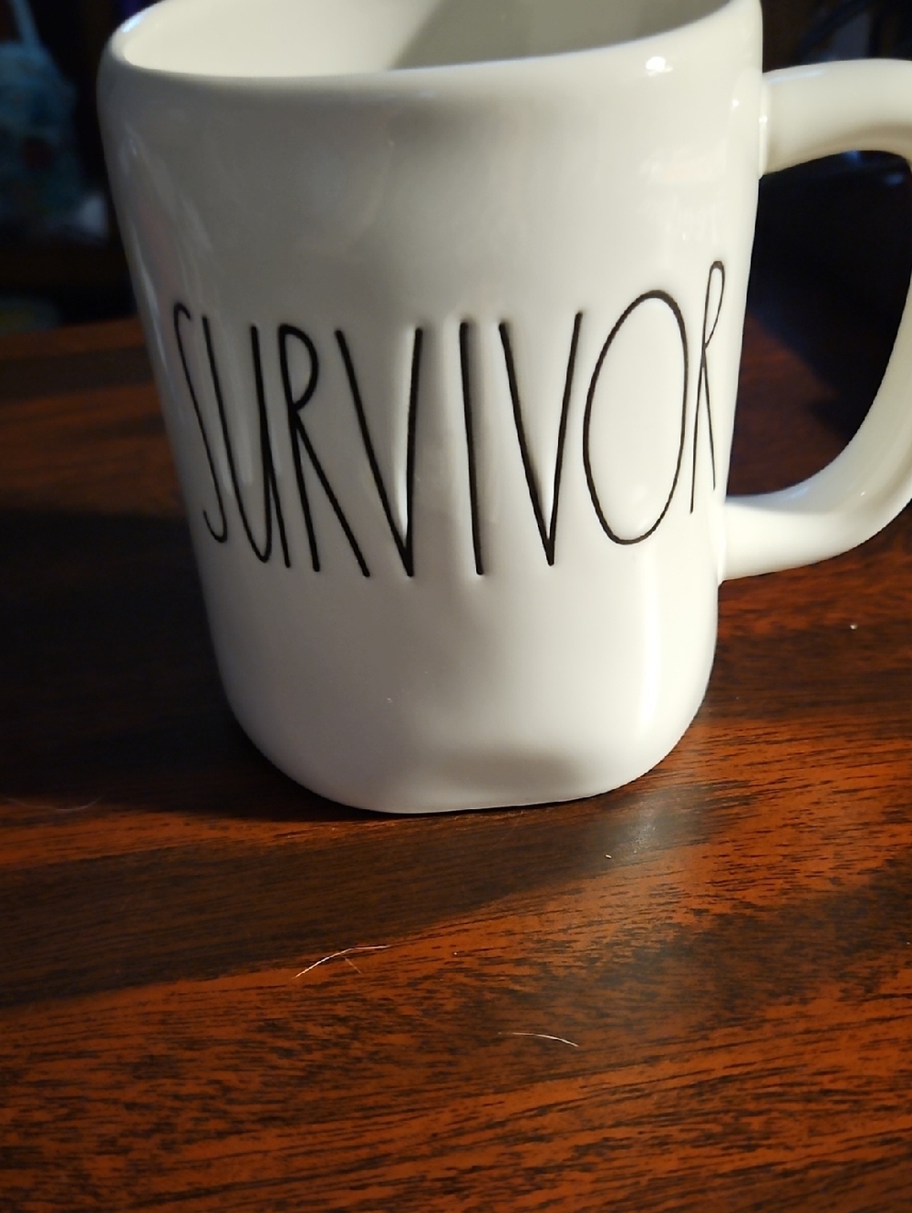 Rae Dunn White Mug with Black 'SURVIVOR' Lettering